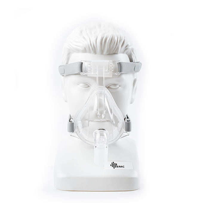 A mannequin wearing a BMC F2 Full Face Mask with Entrainment Elbow.
