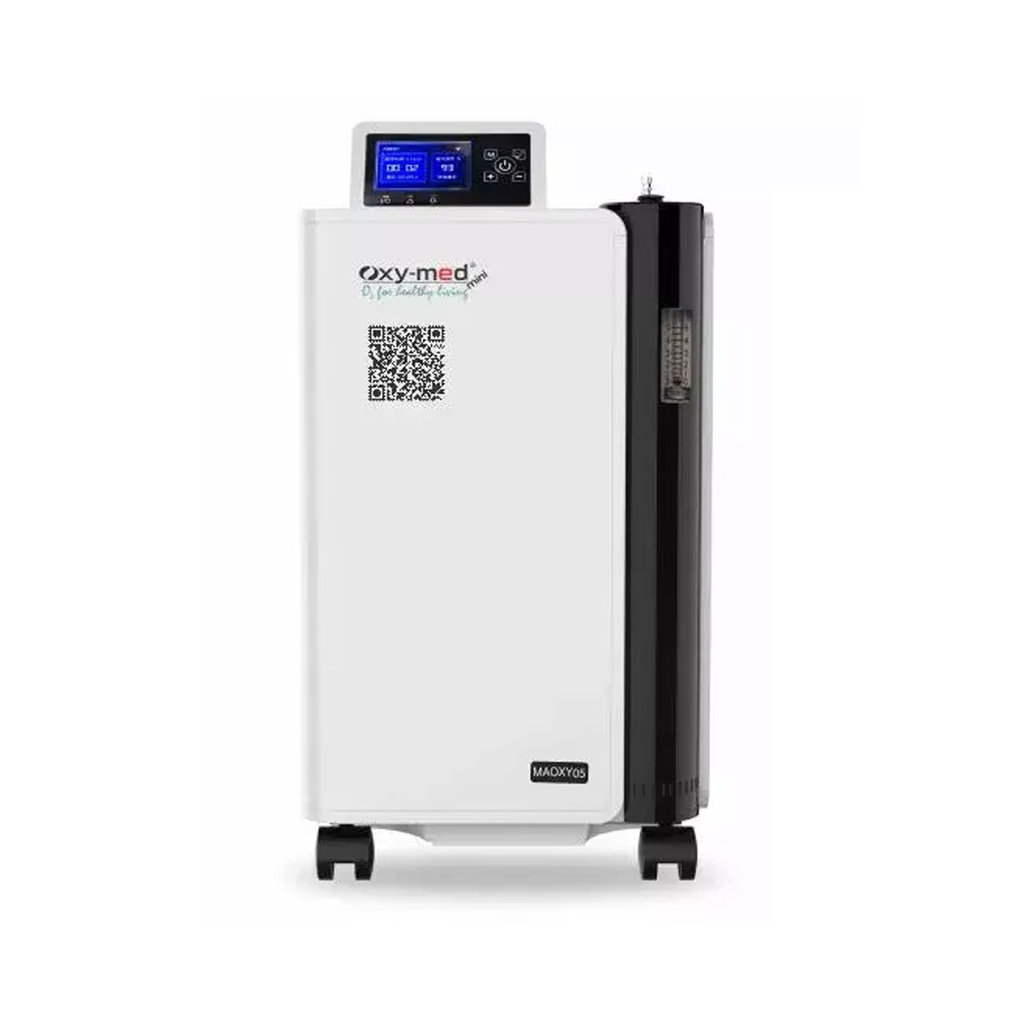 The Oxymed Mini 5 Lpm Home Oxygen Concentrator features a user-friendly LCD display, an intuitive control panel, a flow meter, and wheels for easy mobility.