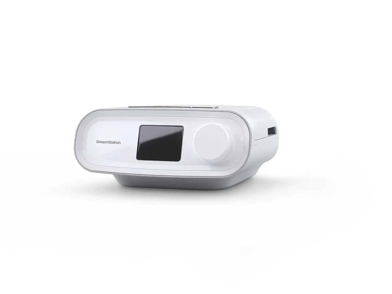 Side view of the Philips Respironics DreamStation Auto CPAP, showing the side lid for the air intake filter.