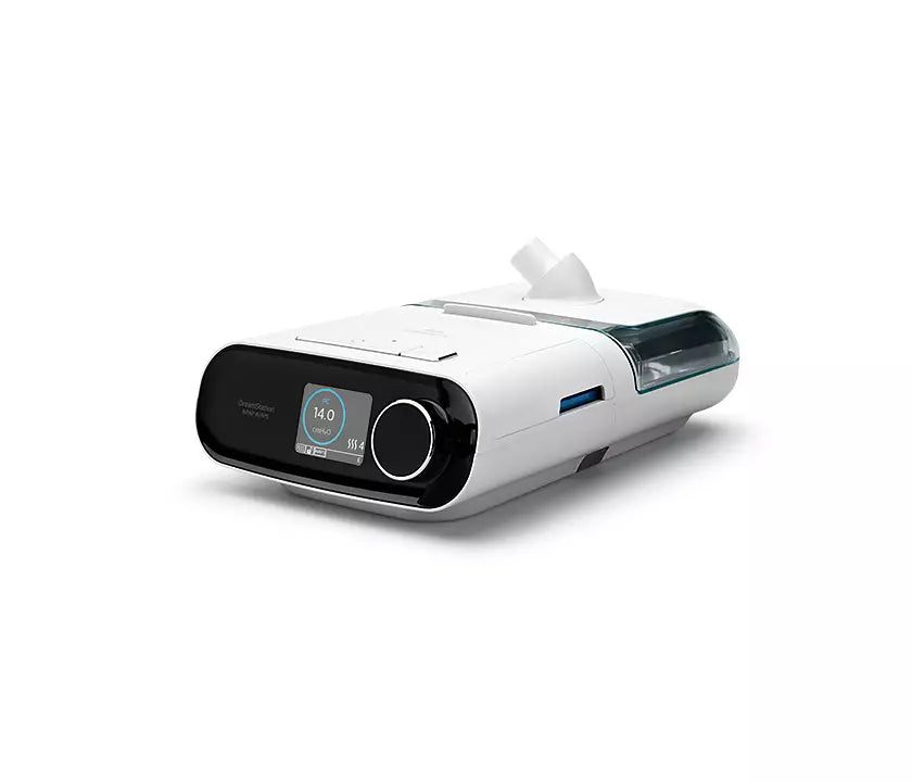Side view of the Philips Respironics DreamStation BiPAP AVAPS 25 with the DreamStation Humidifier attached.