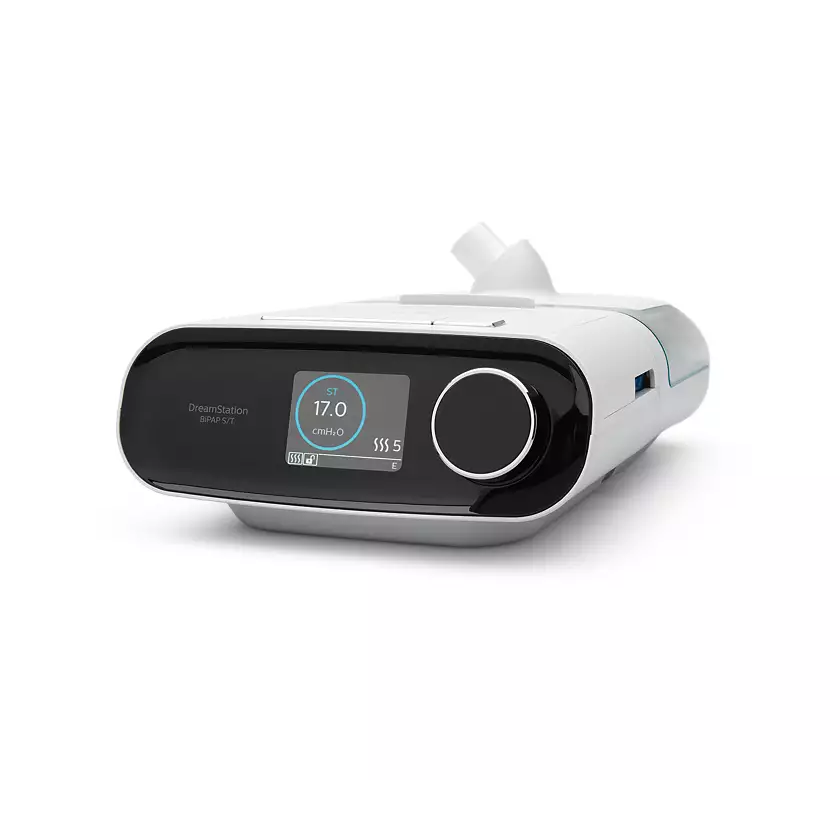 Side view of the Philips Respironics DreamStation BiPAP S/T with the DreamStation Humidifier attached.