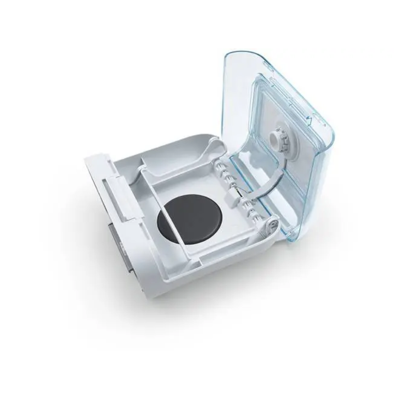 Philips Respironics DreamStation Humidifier chamber opened with the water tank removed, showing the heating plate.