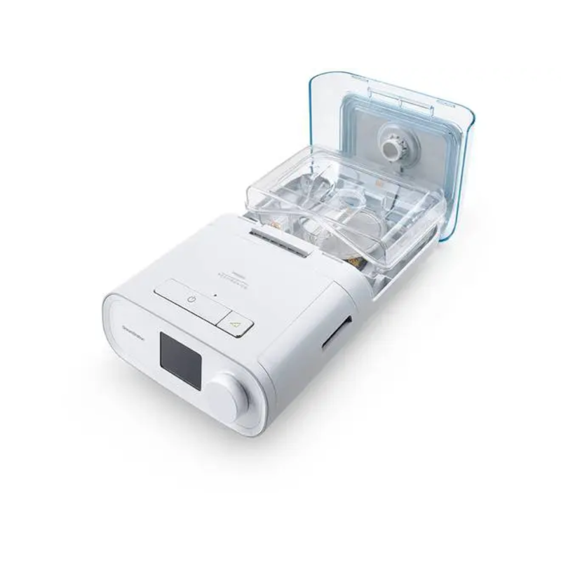 Philips Respironics DreamStation Auto CPAP with attached DreamStation Humidifier, lid open to reveal the water tank.