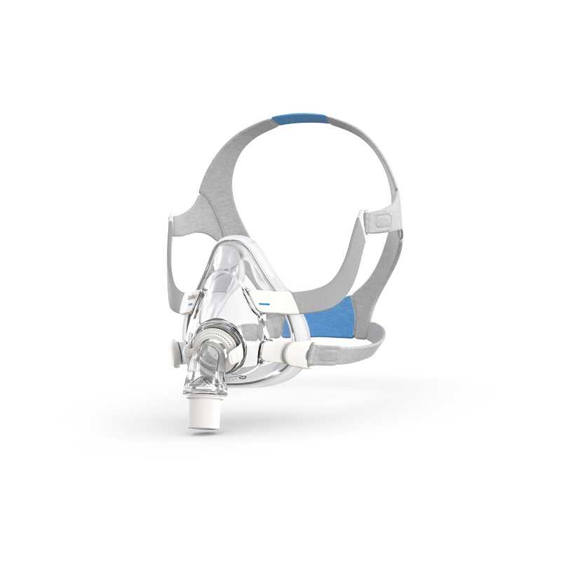 Angled view of the ResMed AirFit F20 Full Face Mask with headgear and magnetic clips.